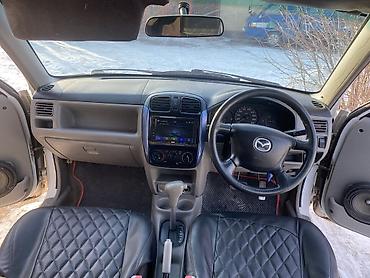 Mazda: Mazda Demio: 2001 г., 1.3 л, Автомат, Бензин, Универсал — 8