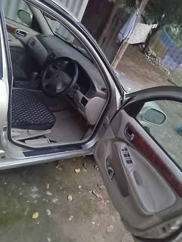 мицубиси спец стар: Nissan Bluebird: 2004 г., Автомат, Бензин, Седан — 5