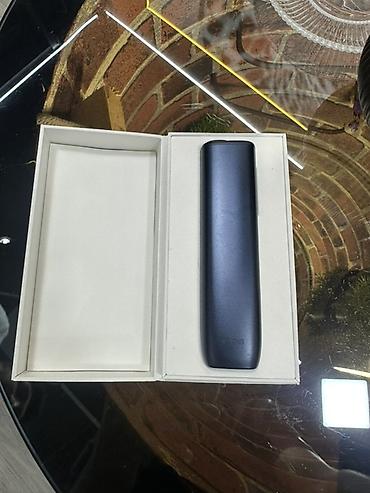 glo tutun: IQOS elektron siqaret cihazı, tünd göy rəngdə korpusla təqdim olunur — 1
