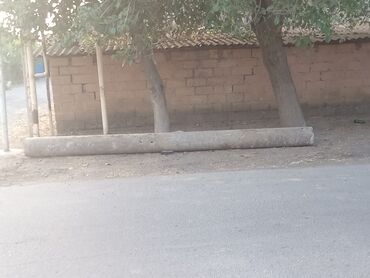 Döşəmə: Uzun, silindrik formalı beton tir. Bu tir tikinti layihələrində