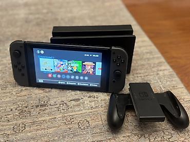 stick game: Nintendo Switch (модель с док-станцией) — комплект для игры дома и в — 1