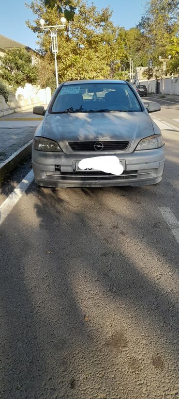 продажа запчастей на авто: Opel Astra sedan (təxminən G nəsli), gümüş rəng. Texniki