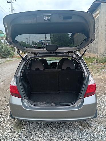 civic 5: Honda Fit: 2004 г., 1.3 л, Вариатор, Бензин, Хэтчбэк — 9