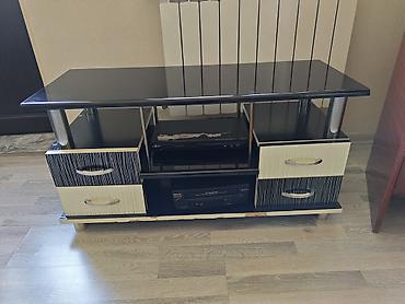 ev telefon altlığı: TV stenti — 1