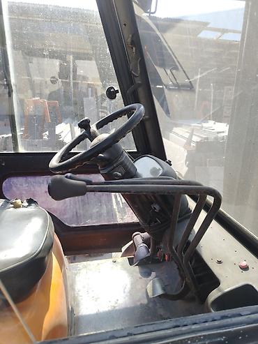 şəxsi yük maşını ilə iş: Yükqaldıran “Forklift” — sənaye və anbar işləri üçün Xüsusiyyətlər: - — 7