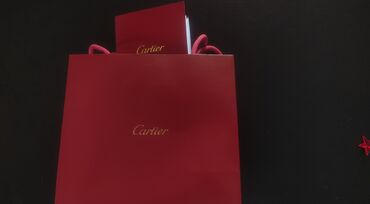 komplekt qızıl destleri: Cartier Gold Keyring . Azerbaycanda tekdir. Senedleri tamdır çeki var