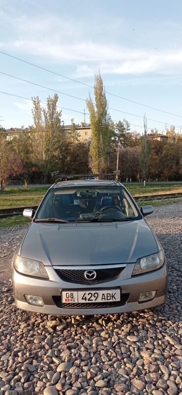 коробка гетраг: Mazda 323: 2003 г., 1.6 л, Механика, Газ, Хетчбек