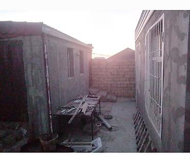 Həyət evləri və villaların satışı: Satilir heyet evi,manalit evdir,144 kv,ev 3 sot torpaqda tikilib, hem — 10