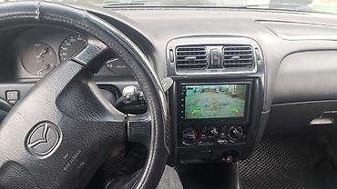 385 55: Mazda 626: 1997 г., Механика, Бензин, Седан — 4