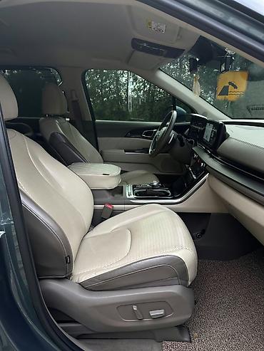 Kia: Kia Carnival: 2022 г., Минивэн — 12