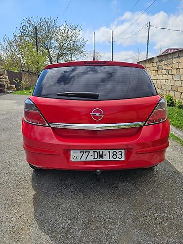 Opel: Opel Astra H hatchback – parlaq qırmızı rəngdə, 5 qapı. Texniki — 8