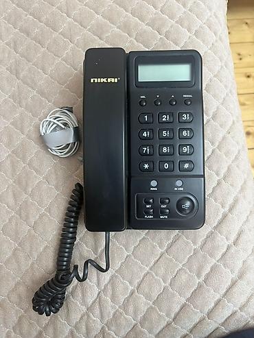 honor x8a kabro: NIKAI markalı masaüstü simli telefon. Klassik qara rəngdədir və ev — 1