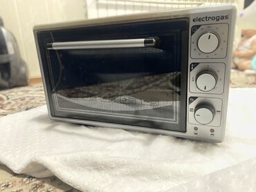 ломбард телевизоры: Серебристая большая духовка Electrogaz размер 50/40 высота 30 см