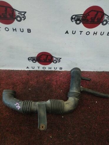 Рулевые шлейфы: Гофра воздушная Mazda Demio DW5W 1.5 1997 (б/у) КУЗОВНЫЕ ДЕТАЛИ -