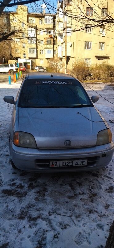 дождевик с логотипом: Honda Logo: 1997 г., 1.3 л, Вариатор, Бензин, Купе