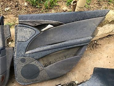 Avtomobil salonu üçün digər detallar: Mercedes-Benz W211, 2004 il — 2