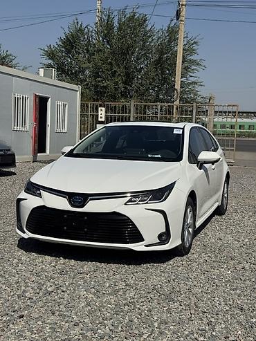spark 2018: Toyota Corolla: 2019 г., 1.8 л, Вариатор, Гибрид, Седан — 2