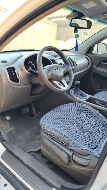 Kia: Kia Sportage: 2.4 l | 2011 il Sedan — 21