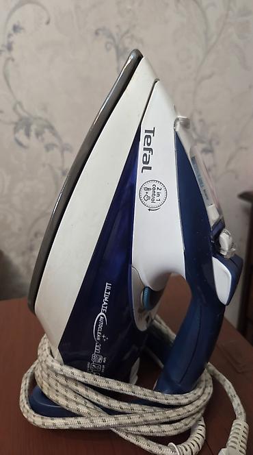 ütü tefal: Tefal Ultimate Autoclean 300 buxarlı ütü - Güc: 2600 W - Buxar gücü — 1