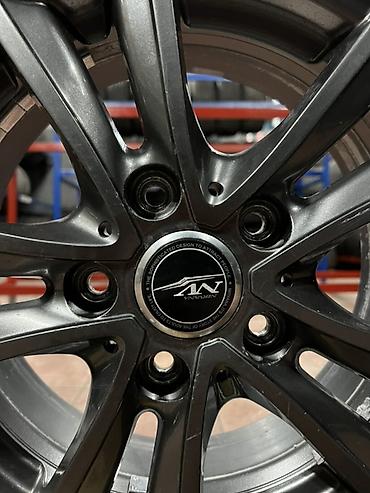Транспорт: Комплект колес в сборе на литых дисках. - Шины: Bridgestone Studless — 10