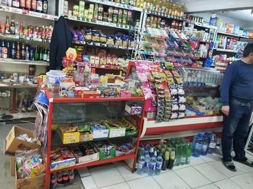 Sifarişlə market vitrinləri: Günay Market – çoxçeşidli gündəlik ərzaq və içkilər - Ünvan nişanı — 7