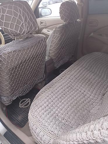 byd disk teker: Nissan Sunny: 1.3 l | 2008 il Sedan — 2
