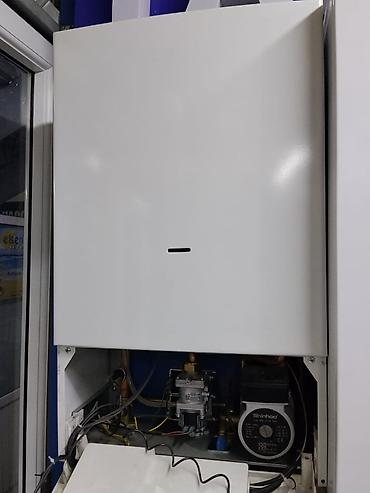 Настенный газовый двухконтурный котел для отопления и ГВС -
