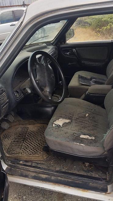 запчасти портер 1: GAZ Volga 3110 sedan - Kuzov: 4 qapılı sedan, gümüşü rəng - Mühərrik — 6