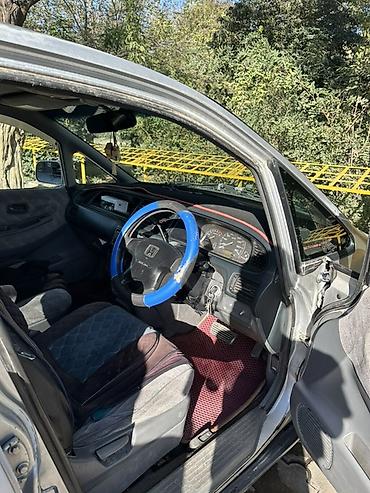 Другие детали салона: Honda — одиссей,салон минивэна. Основные особенности: - Просторный — 6