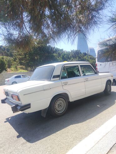 VAZ (LADA): VAZ 2106 sedan, ağ rəng. Klassik kuzov, 4 qapı, arxa ötürücülü. Ön və — 7