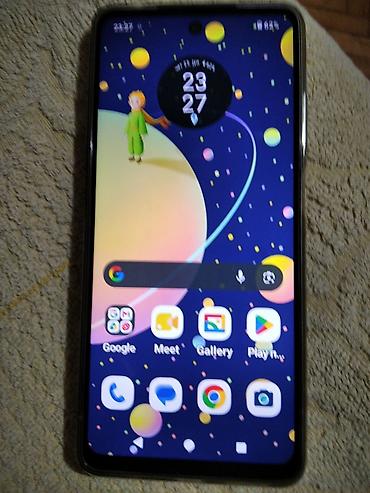 torba za dokumente: Motorola e14 bez ostecenja, baterija dobra.Telefon star godinu dana — 1