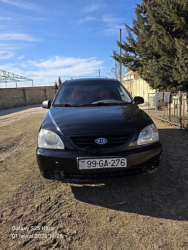 kia r17: Kia Carens, qara rəng, 5 qapılı MPV/miniven. - dizel mühərriki, ön — 3