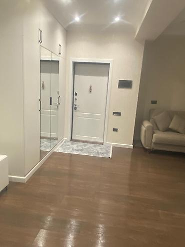 Daşınmaz əmlak: 2 otaqlı, Yeni tikili, 61 kv. m — 1