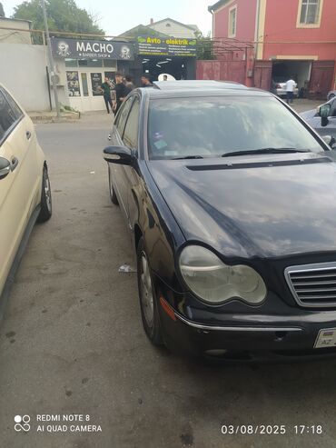Mercedes-Benz C 240: 2.6 л | 2003 г. Седан