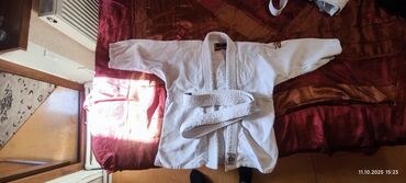 детские хлопковые футболки: Məhsul: 2 ədəd - 10 yaş Uşaq üçün cüdo Brend: Adidas Rəng: Ağ