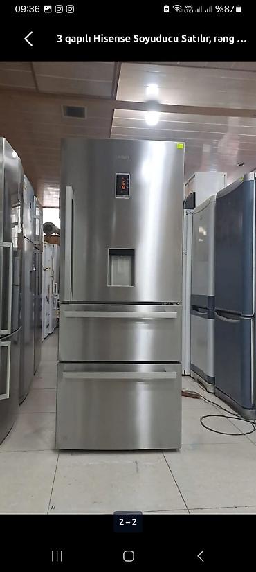 ventilyator satilir: Hisense brendindən 3 qapılı gümüşü soyuducu. Bu modeldə rahat istifadə — 1