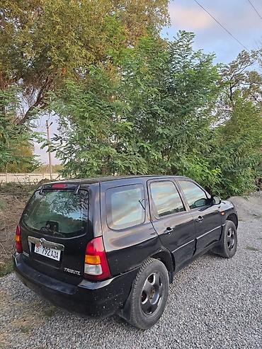 пробег пробега: Mazda Tribute: 2001 г., 2 л, Механика, Газ, Кроссовер — 4
