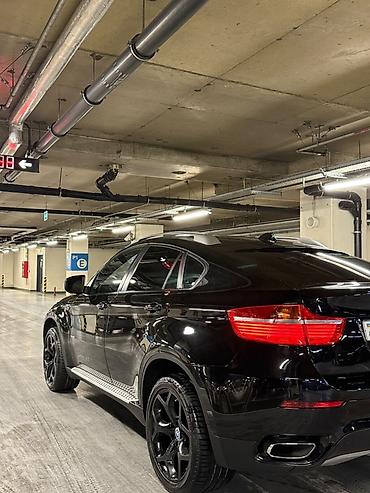 zapi masin: BMW X6 – qara rəng, kupe-SUV dizaynı. Güclü və dinamik görünüş, ikili — 2
