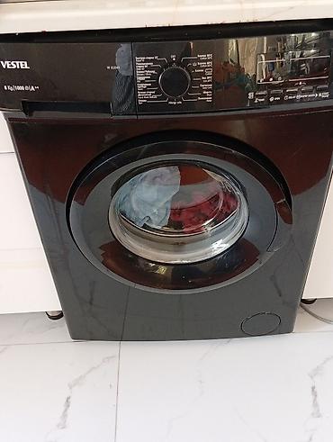 Paltaryuyan maşınlar: Vestel önyükləməli paltaryuyan maşın - Model: W 6104B (paneldə — 1