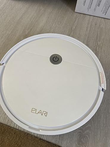 roboclean 114f: Робот-пылесос ELARI в белом корпусе. Компактная круглая модель для — 2