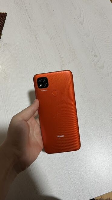 телефон fly iq4514 evo tech 4: Redmi 9C, 32 ГБ, цвет - Оранжевый, Отпечаток пальца, Две SIM карты
