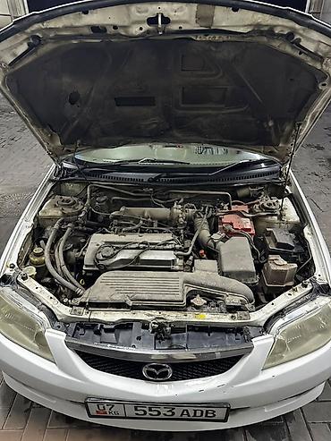 Продажа авто: Mazda Familia: 2002 г., Бензин, Седан — 4