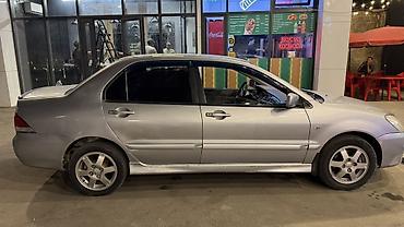 мотор на лансер: Mitsubishi Lancer: 2005 г., 1.6 л, Автомат, Бензин, Седан — 4