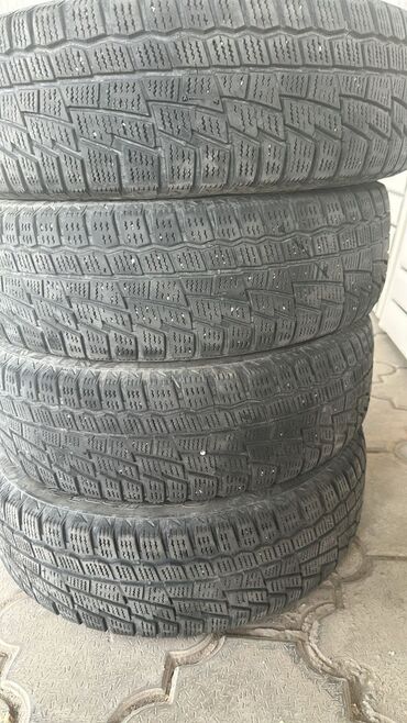 зимние шины на ниву 21214: Покрышки 185 65 15 gordiant зима