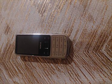 işlenmiş telfonlar: Nokia 6700 Slide, rəng - Gümüşü