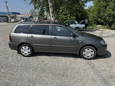 мотор морнинг: Toyota Corolla: 2003 г., 1.6 л, Механика, Бензин, Универсал — 2