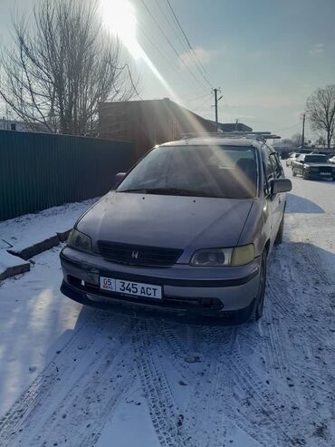 бампер опель вектра а: Автомобиль Honda Odyssey, минивэн серебристого цвета. Оснащен