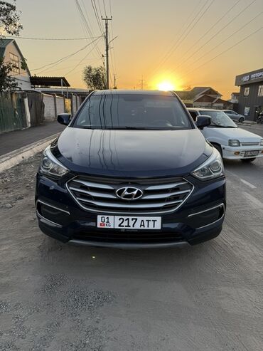 купить передний бампер на мерседес w210 в бишкеке: Hyundai Santa Fe, представленный в темно-синем цвете, является