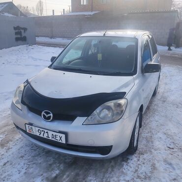 чехлы для салона: Mazda Demio: 2006 г., 1.3 л, Механика, Бензин, Универсал