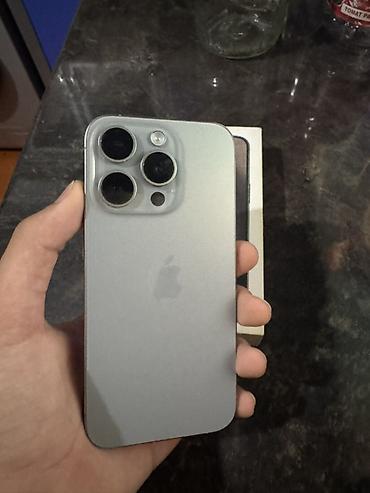 2ci el soyuducu: IPhone 15 Pro, 128 GB, Natural Titanium, Face ID — 1